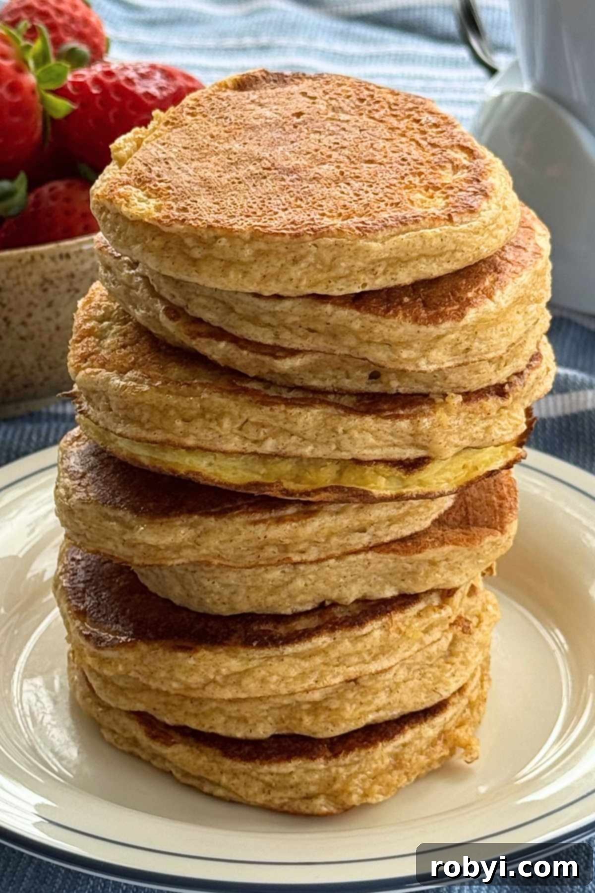 Stack of cottage cheese and oat pancakes on a plate